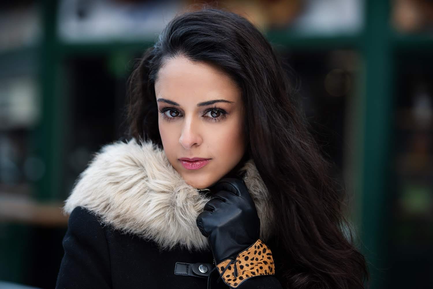 Hila Fahima in a winter coat, portrait by Shirley Suaretz