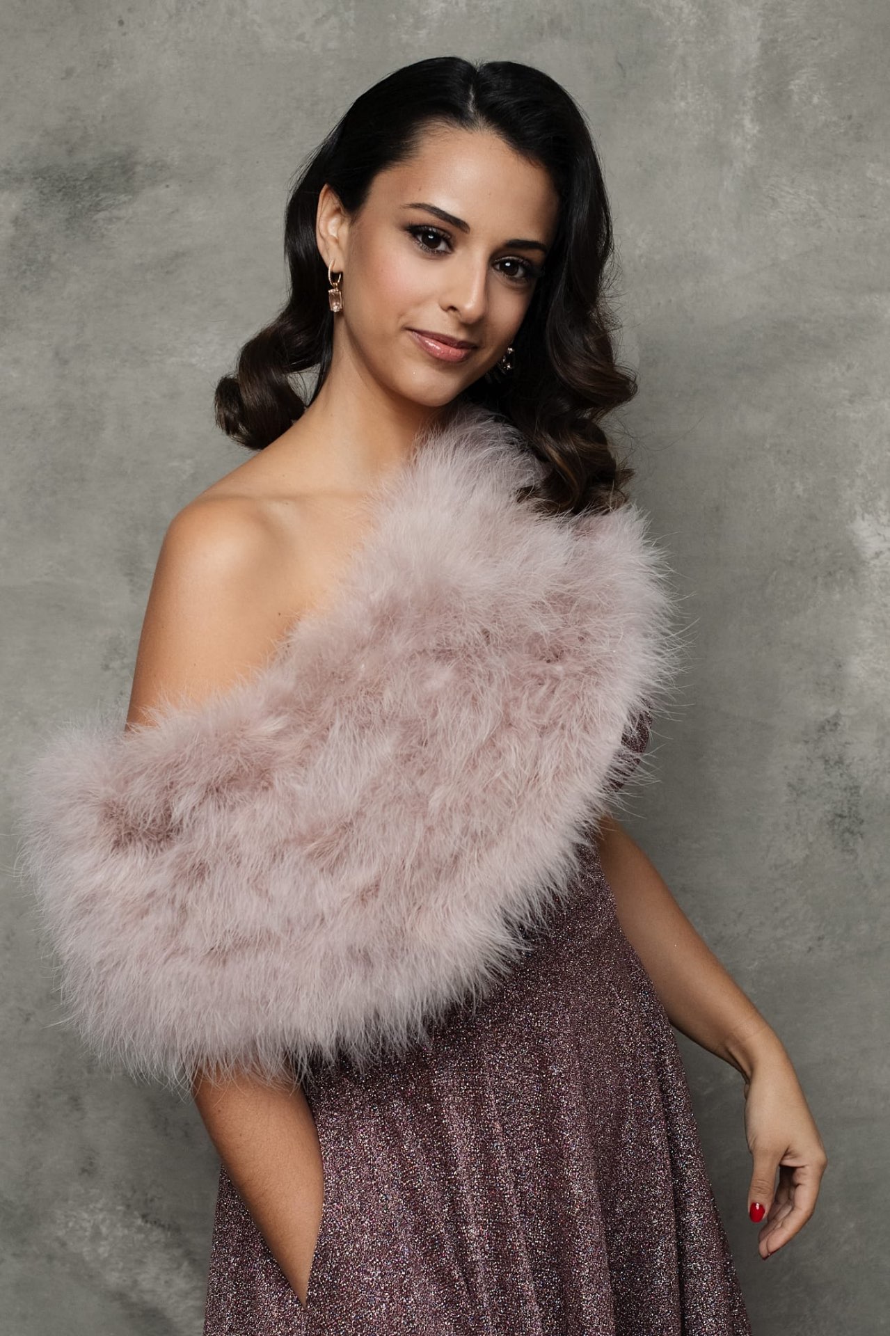 Hila Fahima in a feathered stole, portrait by Monarcha Studio