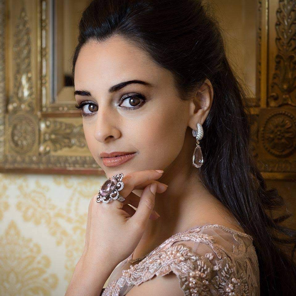 Hila Fahima in a gilded interior, portrait by Lizelle de Wit